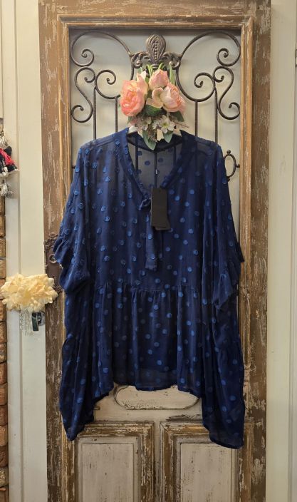 Grizas silkkipaita 51414 Yon sininen lapikuultava pallokuosi ja suloinen rusetti kauluksessa Tama Grizas paita on