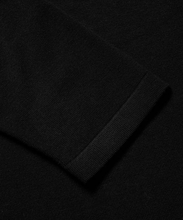 MASAI jakku Lon (Musta) Pitka neuletakki on taydellinen tyylikkaaseen kerroksiseen lookiin. Tama neuletakki on neulottu